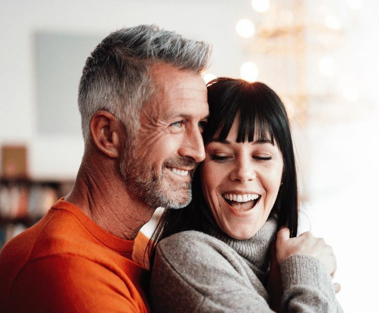 a happy married couple with balanced hormone due to bhrt treatment at health & medspa bhrt clinic in Tampa
