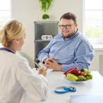 Patient receiving a medical weight loss consultation weight loss clinic