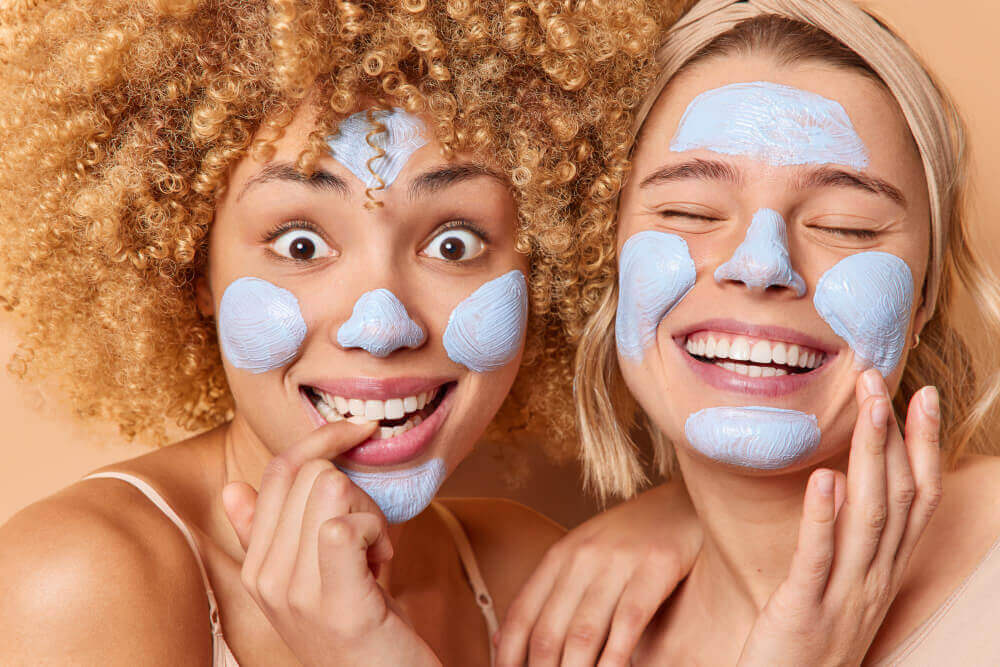 Professional aesthetician cleansing client’s skin during a European facial in Tampa