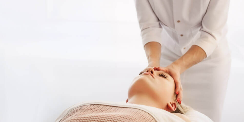 Cosmetic provider administering Botox injections into forehead muscles using fine needle