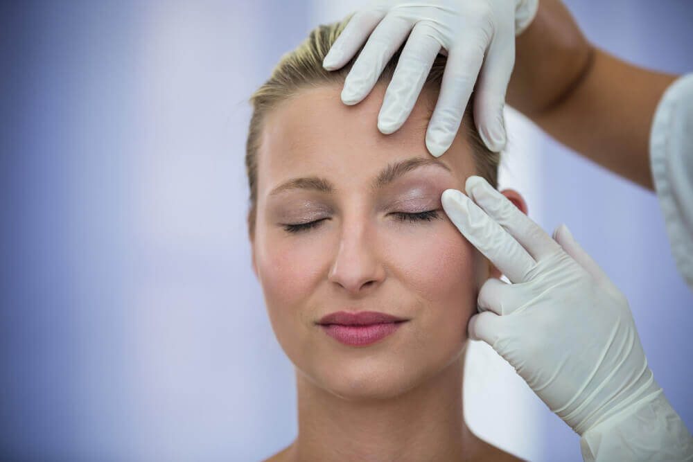 Consultation for Botox treatment in Tampa clinic with facial assessment