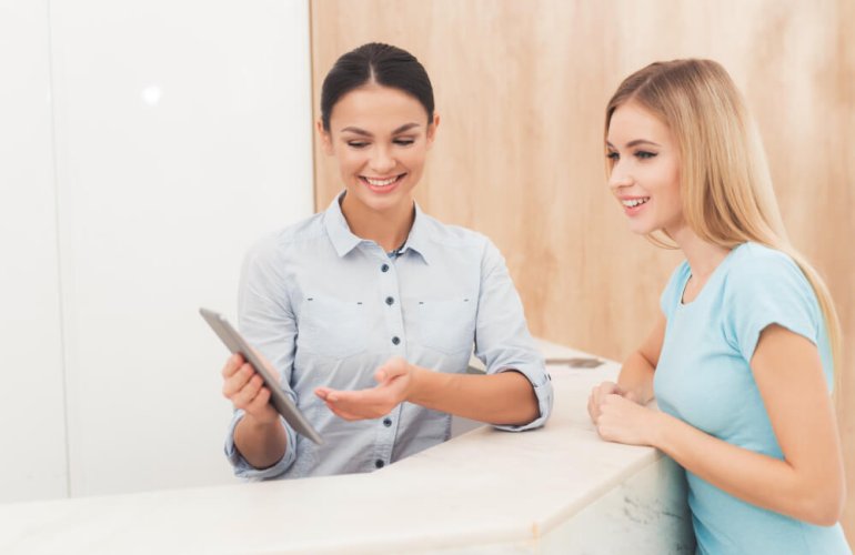 Client consulting with medspa specialist about treatment and financing options in Tampa