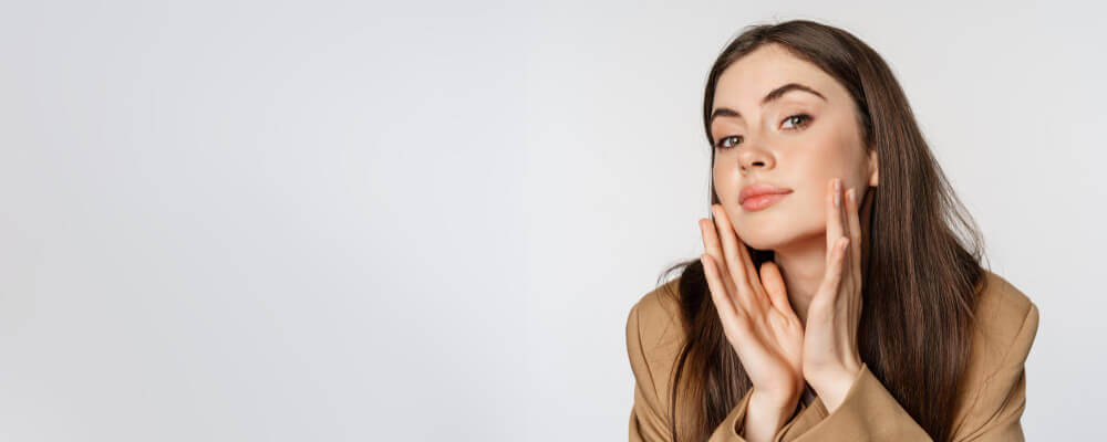 Skin improvement after yellow light therapy reducing post-acne redness and evening out skin tone.