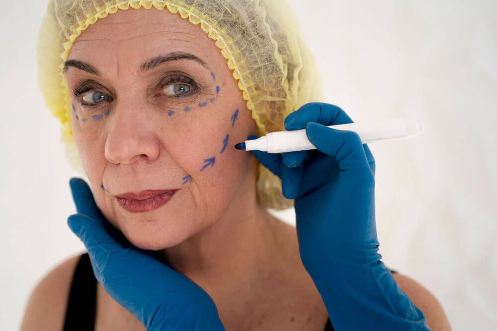 Female client consulting with a cosmetic specialist about Botox versus fillers for smile lines.